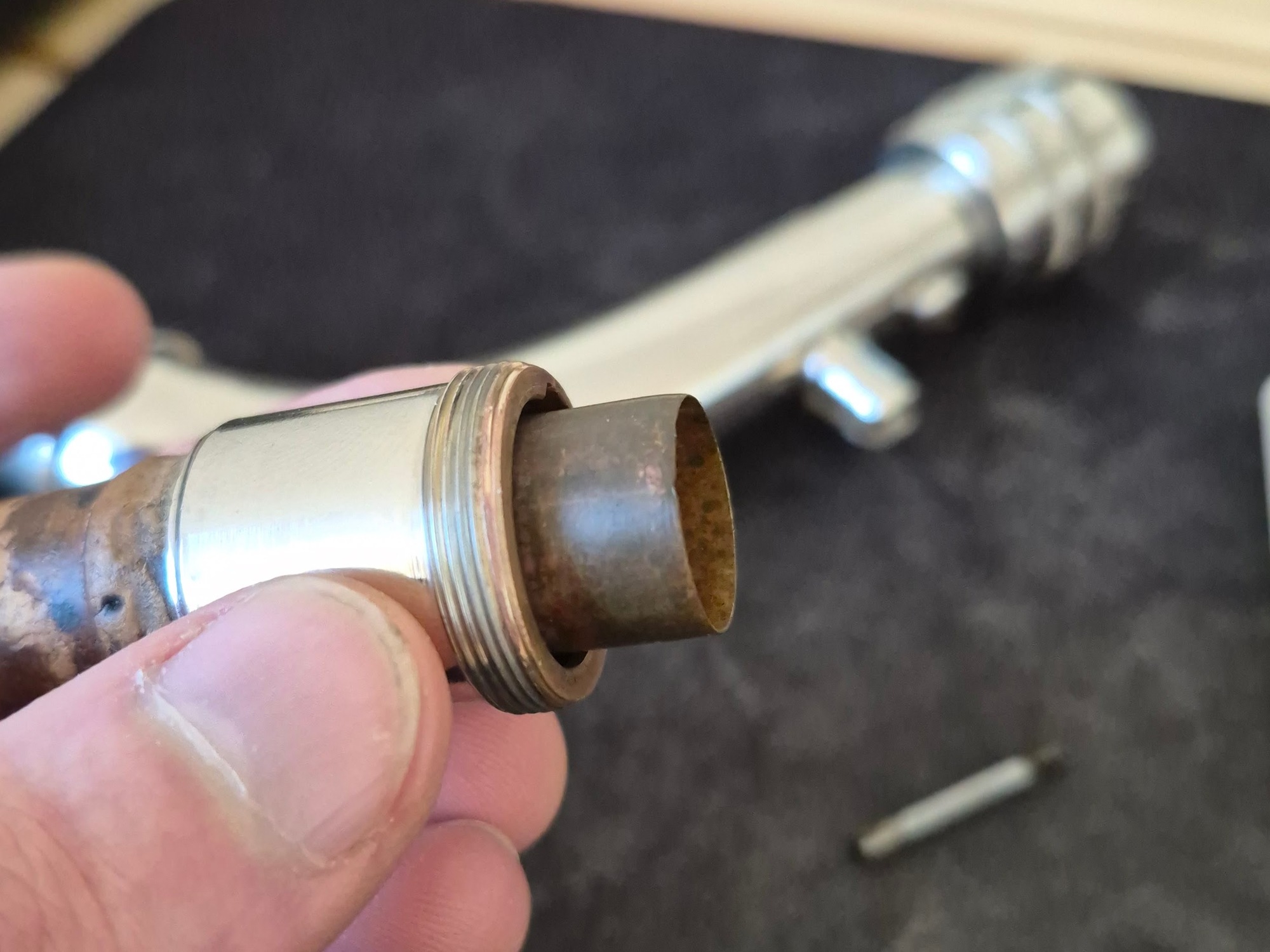 The chewed tooth on the microtuner tube