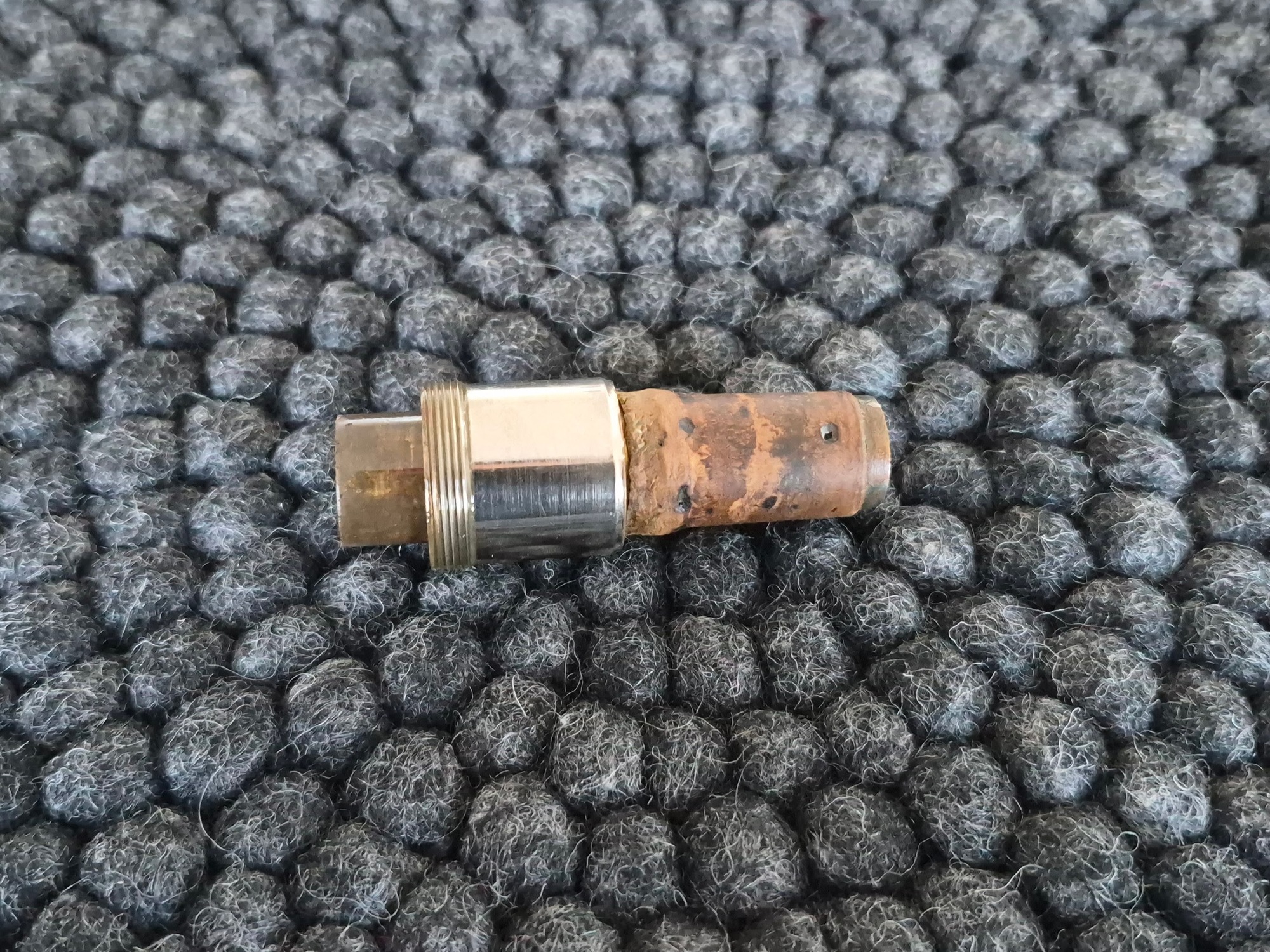 The old cork on the neckpipe.
